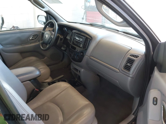2002 Mazda Tribute LX with VIN 4F2CU08172KM58561, listed as a IAAI auction lot 41435407 with 141,908 mi miles and . Bid and sale history available at carsss.com. Image 5.
