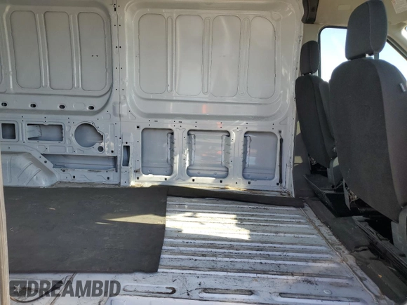 2023 Ford Transit Cargo z VIN 1FTBW3X84PKB21441, wystawiony jako Copart lot #54926995 z przebiegiem 56 038 mil mil oraz Szkoda całkowita • Salvage title. Historia ofert i sprzedaży dostępna na DreamBid. Obrazek 11.