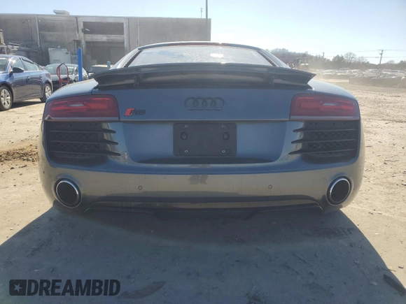 2014 Audi R8 z VIN WUAAUAFG0EN000936, wystawiony jako Copart lot #46513185 z przebiegiem Nie podano mil oraz Szkoda całkowita • Salvage title. Historia ofert i sprzedaży dostępna na DreamBid. Obrazek 6.