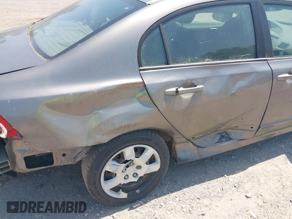 2006 Honda Civic LX with VIN 1HGFA165X6L151906, listed as a IAAI auction lot 42581843 with 97,675 mi miles and . Bid and sale history available at DreamBid. Image 14.