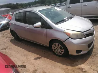 2012 Toyota Yaris L with VIN JTDKTUD35CD531056, listed as a IAAI auction lot 42169341 with 114,955 mi miles. Bid and sale history available at carsss.com. Image 1.
