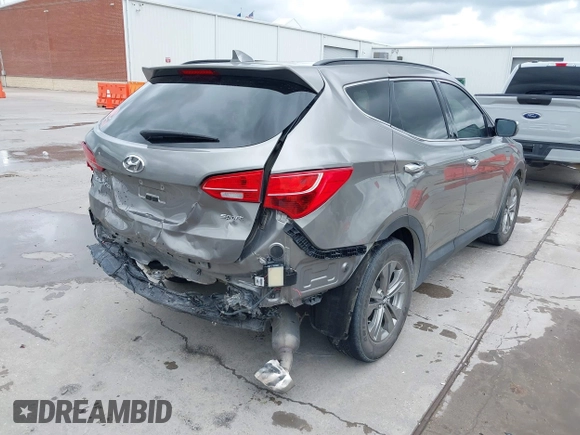 2014 Hyundai Santa Fe with VIN 5XYZU3LB2EG155127, listed as a IAAI auction lot 41864518 with Not provided miles and . Bid and sale history available at DreamBid. Image 4.