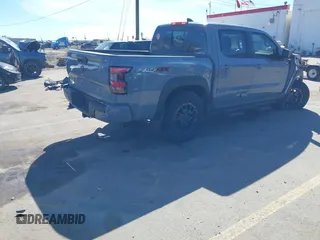 2023 Nissan Frontier SV with VIN 1N6ED1EK2PN633278, listed as a IAAI auction lot 41854671 with 59,549 mi miles and . Bid and sale history available at DreamBid. Image 4.