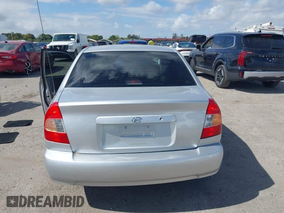 2002 Hyundai Accent GL with VIN KMHCG45C82U268756, listed as a IAAI auction lot 41569829 with 89,752 mi miles. Bid and sale history available at carsss.com. Image 16.
