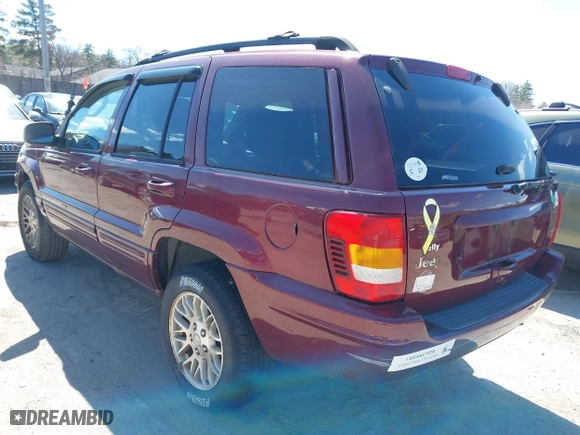 2003 Jeep Grand Cherokee Limited with VIN 1J4GW58S23C577383, listed as a IAAI auction lot 41957536 with 187,755 mi miles. Bid and sale history available at carsss.com. Image 3.