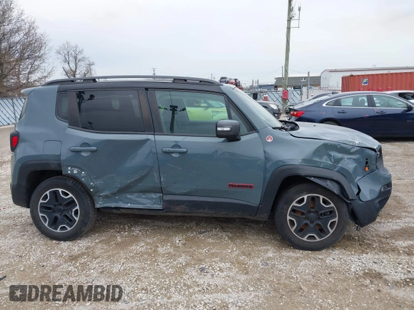 2015 Jeep Renegade Trailhawk z VIN ZACCJBCT4FPB79254, wystawiony jako IAAI lot #41965451 z przebiegiem 87 398 mil mil oraz . Historia ofert i sprzedaży dostępna na DreamBid. Obrazek 13.