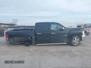 2013 Chevrolet Silverado 1500 LT with VIN 3GCPCSE00DG141940, listed as a IAAI auction lot 41882612 with Not Provided miles. Bid and sale history available at carsss.com. Image 13.