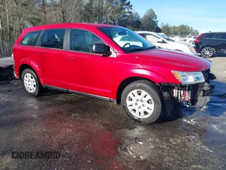 2015 Dodge Journey American Value Pkg with VIN 3C4PDCAB8FT610745, listed as a IAAI auction lot 41812606 with 252,734 mi miles. Bid and sale history available at carsss.com. Image 1.