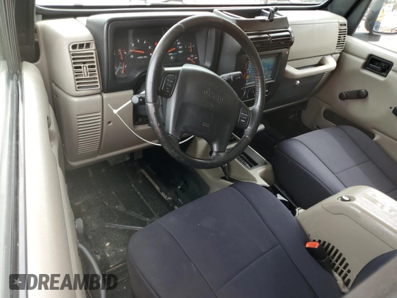2004 Jeep Wrangler Sahara with VIN 1J4FA59SX4P722608, listed as a Copart auction lot 51223345 with 146,600 mi miles and Salvage title. Bid and sale history available at DreamBid. Image 8.