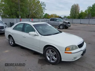 2002 Lincoln LS w/Base Pkg with VIN 1LNHM87A12Y643476, listed as a IAAI auction lot 42131765 with 205,900 mi miles. Bid and sale history available at carsss.com. Image 1.