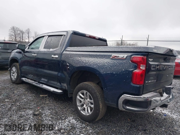 2022 Chevrolet Silverado 1500 LT with VIN 1GCUDDET0NZ597606, listed as a IAAI auction lot 40943441 with 32,673 mi miles and . Bid and sale history available at DreamBid. Image 3.