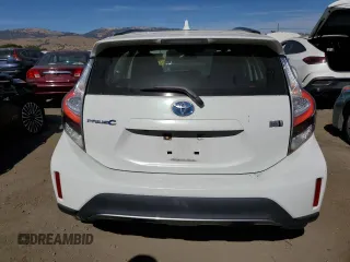 2018 Toyota Prius One with VIN JTDKDTB36J1604525, listed as a Copart auction lot 63838575 with 59,212 mi miles and Salvage title. Bid and sale history available at DreamBid. Image 6.