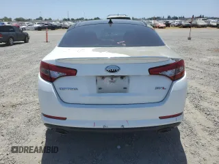 2013 Kia Optima SX с VIN 5XXGR4A69DG175625, выставлен на аукционе Copart как лот 60569165 с пробегом 125 827 миль миль и Списание • Salvage title. История ставок и продаж доступна на DreamBid. Изображение 6.