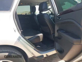 2015 Cadillac SRX Luxury Collection with VIN 3GYFNBE38FS576165, listed as a IAAI auction lot 41974066 with 95,832 mi miles. Bid and sale history available at carsss.com. Image 8.