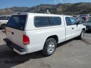 1999 Dodge Dakota with VIN 1B7FL22P0XS288012, listed as a IAAI auction lot 41695852 with 150,431 mi miles. Bid and sale history available at carsss.com. Image 4.