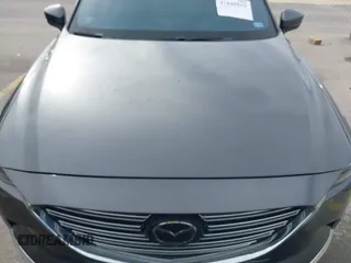 2023 Mazda CX-9 Grand Touring z VIN JM3TCBDY0P0631395, wystawiony jako IAAI lot #41449555 z przebiegiem 17 721 mil mil oraz . Historia ofert i sprzedaży dostępna na DreamBid. Obrazek 6.