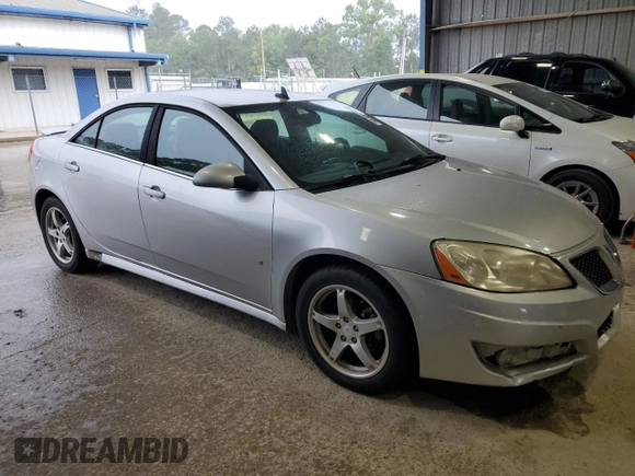 2009 Pontiac G6 GT 1SB z VIN 1G2ZK57K694233980, wystawiony jako Copart lot #54146815 z przebiegiem 96 973 mil mil oraz Szkoda całkowita • Salvage title. Historia ofert i sprzedaży dostępna na DreamBid. Obrazek 4.