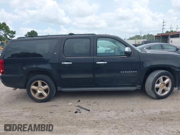 2011 Chevrolet Suburban LT with VIN 1GNSCJE07BR128885, listed as a IAAI auction lot 42456748 with 201,789 mi miles and . Bid and sale history available at DreamBid. Image 13.