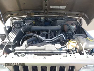 2003 Jeep Wrangler X with VIN 1J4FA39S03P312550, listed as a IAAI auction lot 41837150 with 127,239 mi miles and . Bid and sale history available at DreamBid. Image 10.