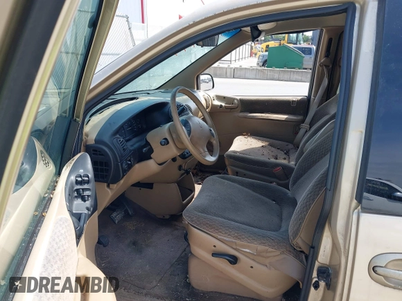 1999 Plymouth Voyager Grand SE z VIN 1P4GP44G0XB613853, wystawiony jako IAAI lot #42064199 z przebiegiem 175 050 mil mil oraz . Historia ofert i sprzedaży dostępna na DreamBid. Obrazek 5.