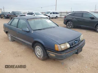 1987 Ford Taurus with VIN 1FABP53U0HA101874, listed as a IAAI auction lot 42619153 with Not provided miles and . Bid and sale history available at DreamBid. Image 1.