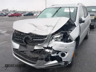 2011 Volkswagen Tiguan SEL w/Premium Navi with VIN WVGAV7AX7BW547613, listed as a IAAI auction lot 41916574 with 140,385 mi miles and . Bid and sale history available at DreamBid. Image 6.