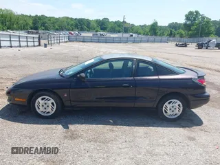 2000 Saturn SC with VIN 1G8ZR1275YZ113537, listed as a IAAI auction lot 42073307 with 276,289 mi miles. Bid and sale history available at carsss.com. Image 14.