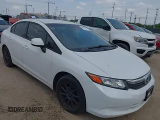 2012 Honda Civic LX z VIN 2HGFB2F54CH571236, wystawiony jako IAAI lot #42065369 z przebiegiem 108 609 mil mil oraz . Historia ofert i sprzedaży dostępna na DreamBid. Obrazek 1.