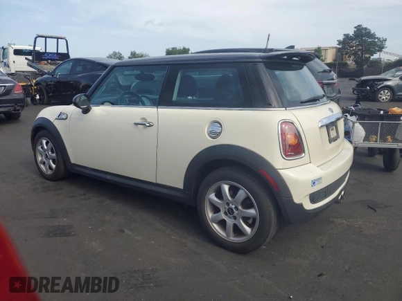 2010 MINI Hardtop S with VIN WMWMF7C59ATZ69213, listed as a Copart auction lot 54270705 with 77,594 mi miles and Salvage Title. Bid and sale history available at DreamBid. Image 2.