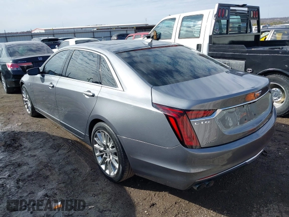 2019 Cadillac CT6 Luxury AWD z VIN 1G6KB5RS6KU117472, wystawiony jako IAAI lot #41643096 z przebiegiem 80 183 mil mil oraz . Historia ofert i sprzedaży dostępna na DreamBid. Obrazek 3.