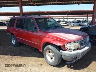 2001 Ford Explorer XLT z VIN 1FMZU63E71ZA30062, wystawiony jako IAAI lot #40083027 z przebiegiem 243 938 mil mil oraz . Historia ofert i sprzedaży dostępna na DreamBid. Obrazek 1.