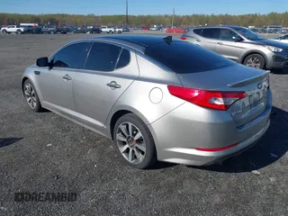 2012 Kia Optima SX with VIN 5XXGR4A68CG025312, listed as a IAAI auction lot 42059942 with 229,150 mi miles and . Bid and sale history available at carsss.com. Image 3.