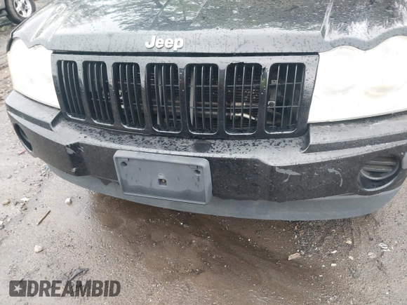 2007 Jeep Grand Cherokee Laredo with VIN 1J8GS48K57C516037, listed as a IAAI auction lot 41982692 with 273,961 mi miles. Bid and sale history available at carsss.com. Image 6.
