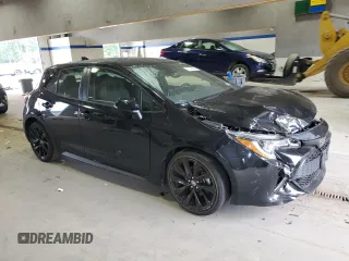 2021 Toyota Corolla Hatchback SE with VIN JTND4MBE9M3135094, listed as a Copart auction lot 71599094 with 51,063 mi miles and Salvage Title. Bid and sale history available at carsss.com. Image 4.