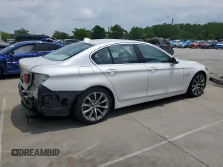 2014 BMW 5 Series 535d xDrive with VIN WBAFV3C57ED685132, listed as a Copart auction lot 60413005 with 94,355 mi miles and Salvage title. Bid and sale history available at DreamBid. Image 3.