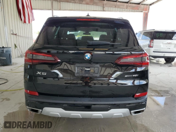 2023 BMW X5 sDrive40i with VIN 5UXCR4C05P9R70324, listed as a Copart auction lot 54661245 with 13,136 mi miles and Salvage title. Bid and sale history available at DreamBid. Image 6.