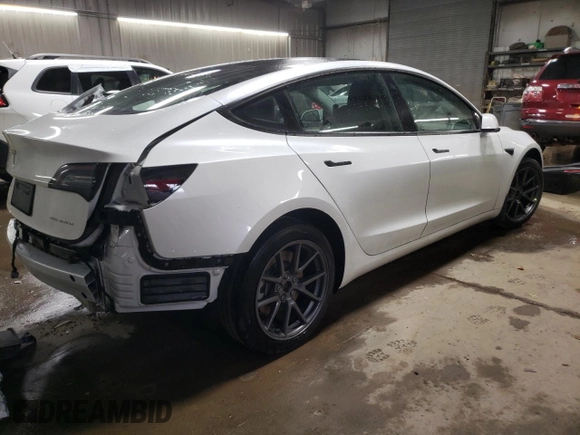2022 Tesla Model 3 Long Range with VIN 5YJ3E1EB5NF334516, listed as a Copart auction lot 43247755 with 23,412 mi miles and Salvage Title. Bid and sale history available at DreamBid. Image 3.