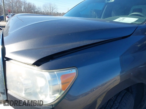 2013 Toyota Tundra z VIN 5TFRM5F18DX062669, wystawiony jako IAAI lot #41492200 z przebiegiem 100 531 mil mil oraz . Historia ofert i sprzedaży dostępna na DreamBid. Obrazek 20.