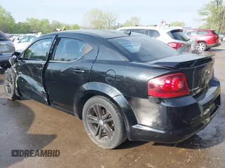 2014 Dodge Avenger SE with VIN 1C3CDZAB6EN120955, listed as a IAAI auction lot 42030602 with Not provided miles and . Bid and sale history available at DreamBid. Image 3.