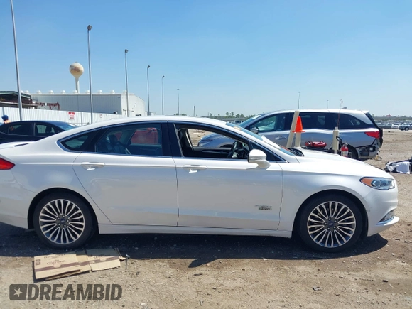 2017 Ford Fusion Titanium with VIN 3FA6P0SUXHR147336, listed as a IAAI auction lot 41873106 with 103,247 mi miles and . Bid and sale history available at DreamBid. Image 13.