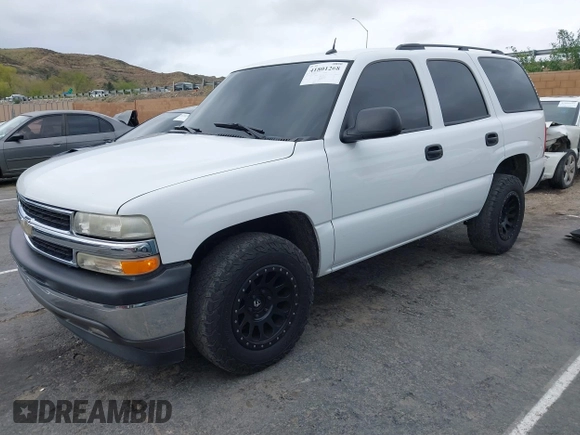 2005 Chevrolet Tahoe LS with VIN 1GNEC13V85J243672, listed as a IAAI auction lot 41801268 with 202,624 mi miles and . Bid and sale history available at DreamBid. Image 2.