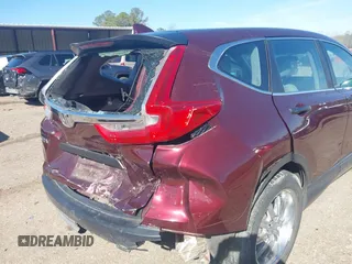 2019 Honda CR-V LX with VIN 2HKRW5H30KH414385, listed as a IAAI auction lot 41869188 with 91,473 mi miles and . Bid and sale history available at DreamBid. Image 13.