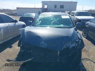 2009 Toyota Matrix with VIN 2T1KU40EX9C084721, listed as a IAAI auction lot 41748177 with 148,374 mi miles. Bid and sale history available at carsss.com. Image 12.