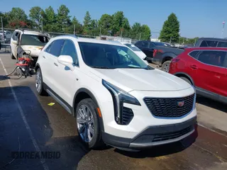 2020 Cadillac XT4 FWD Premium Luxury with VIN 1GYFZCR45LF030713, listed as a IAAI auction lot 42623390 with 48,765 mi miles and . Bid and sale history available at DreamBid. Image 1.