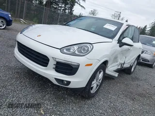 2017 Porsche Cayenne with VIN WP1AA2A23HKA89803, listed as a IAAI auction lot 41939952 with 79,239 mi miles. Bid and sale history available at carsss.com. Image 2.