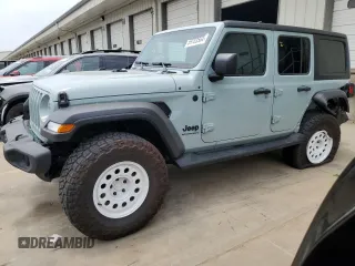 2023 Jeep Wrangler Sport with VIN 1C4HJXDN0PW643485, listed as a Copart auction lot 59783564 with 14,001 mi miles and Salvage Title. Bid and sale history available at DreamBid. Image 1.