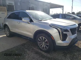 2021 Cadillac XT4 FWD Sport with VIN 1GYFZER41MF006261, listed as a Copart auction lot 45553664 with 14,402 mi miles and . Bid and sale history available at DreamBid. Image 4.