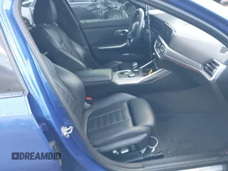 2020 BMW 3 Series M340i xDrive with VIN WBA5U9C00LFH03223, listed as a IAAI auction lot 41020498 with 58,775 mi miles and . Bid and sale history available at DreamBid. Image 5.