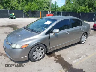 2006 Honda Civic LX z VIN 1HGFA16586L083119, wystawiony jako IAAI lot #42237313 z przebiegiem Nie podano mil oraz . Historia ofert i sprzedaży dostępna na DreamBid. Obrazek 18.