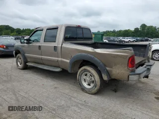2003 Ford F-350 XL with VIN 1FTSW31F13EA50456, listed as a Copart auction lot 62838035 with 214,969 mi miles and Salvage title. Bid and sale history available at DreamBid. Image 2.